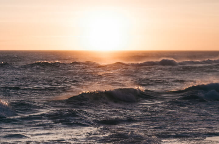 A warmly lit oceanic sunset symbolizing our authentic vision of building a more productivity-centric browsing experience.